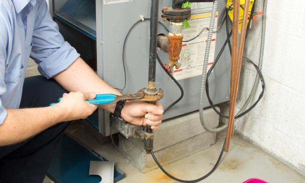 Man working on electrical panel