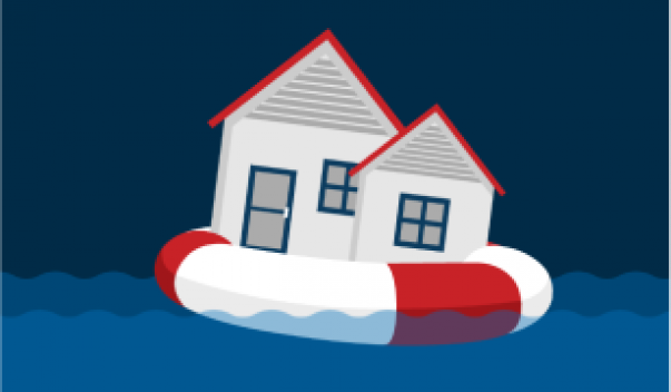 House floating on a raft in flood waters