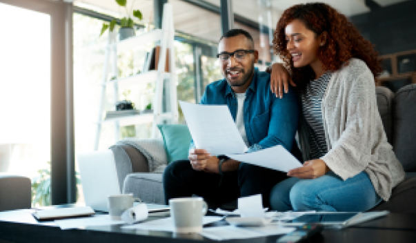 Couple reviewing their homeowner policy checklist