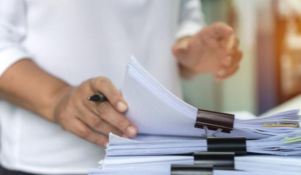Person holding documents